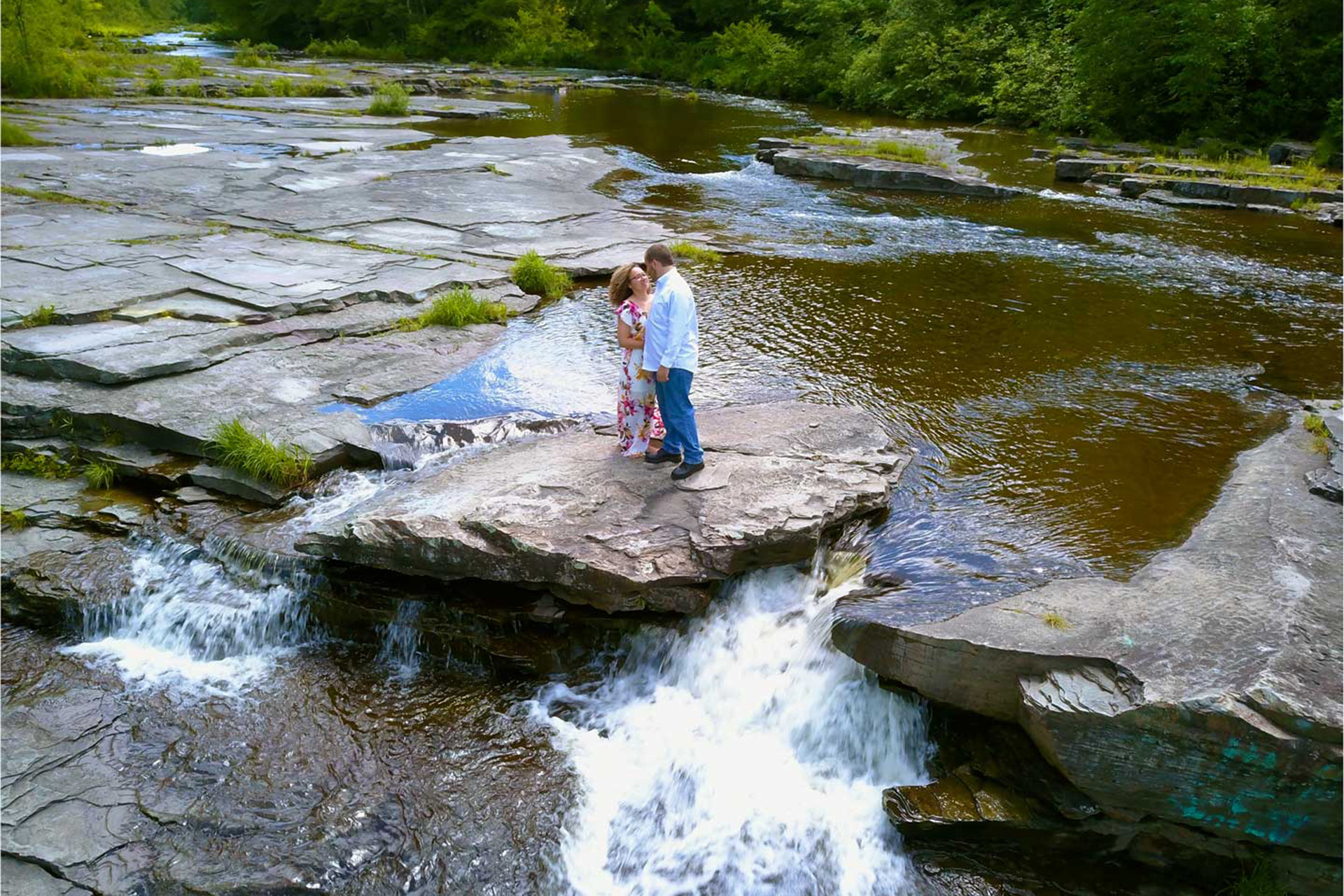 engagement couple on the falls edge
