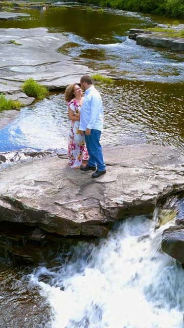 engagement couple on the falls edge