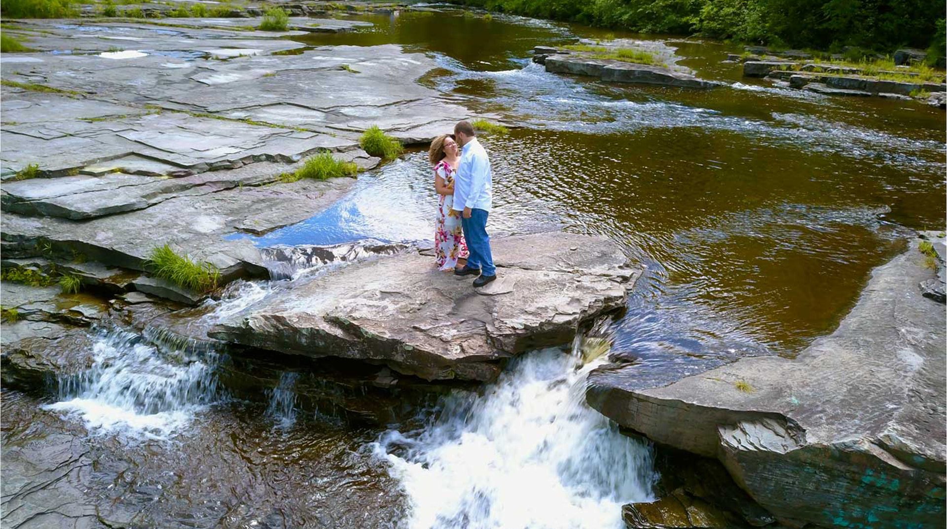 engagement couple on the falls edge